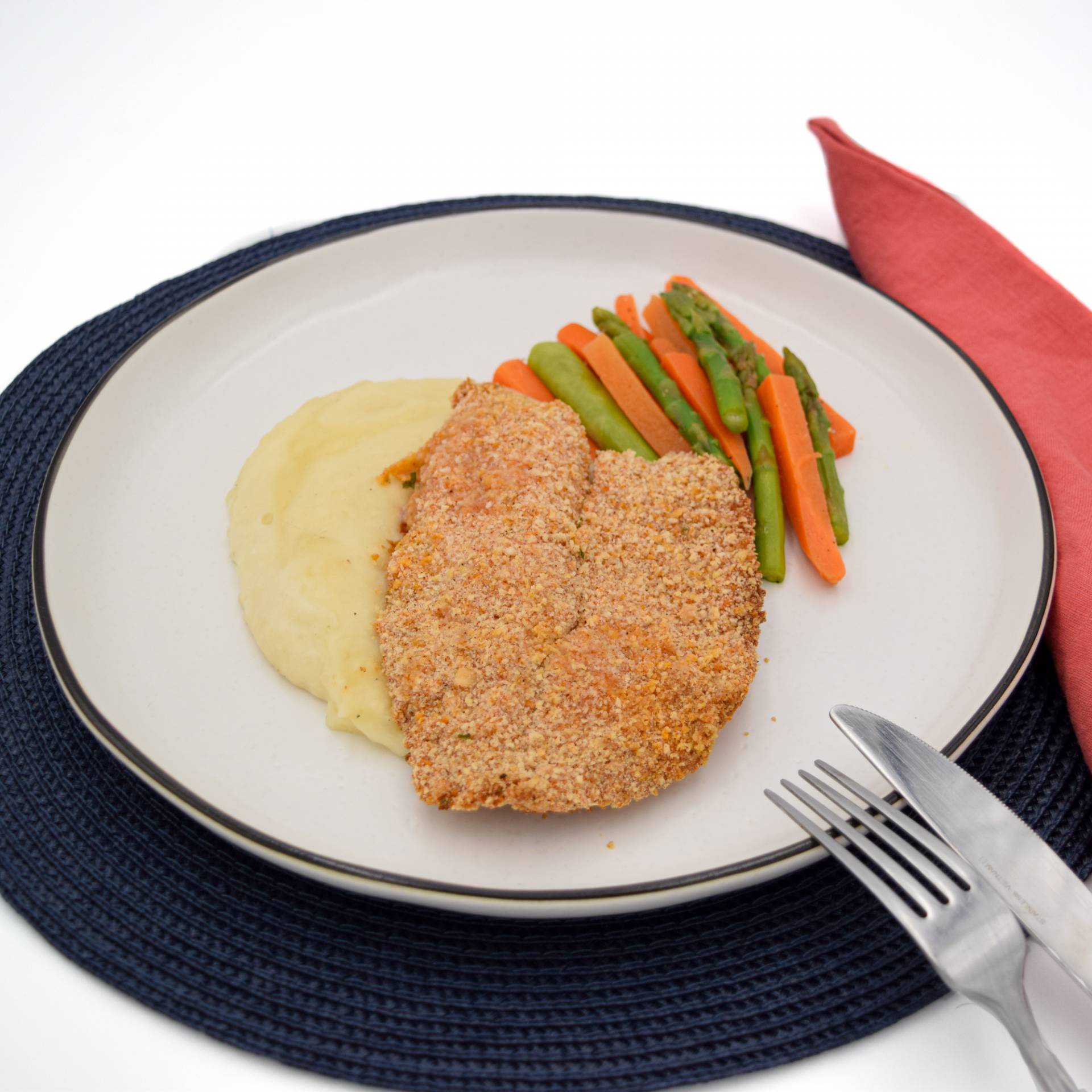 Panko crusted tilapia with yucca mash, carrots and asparagus