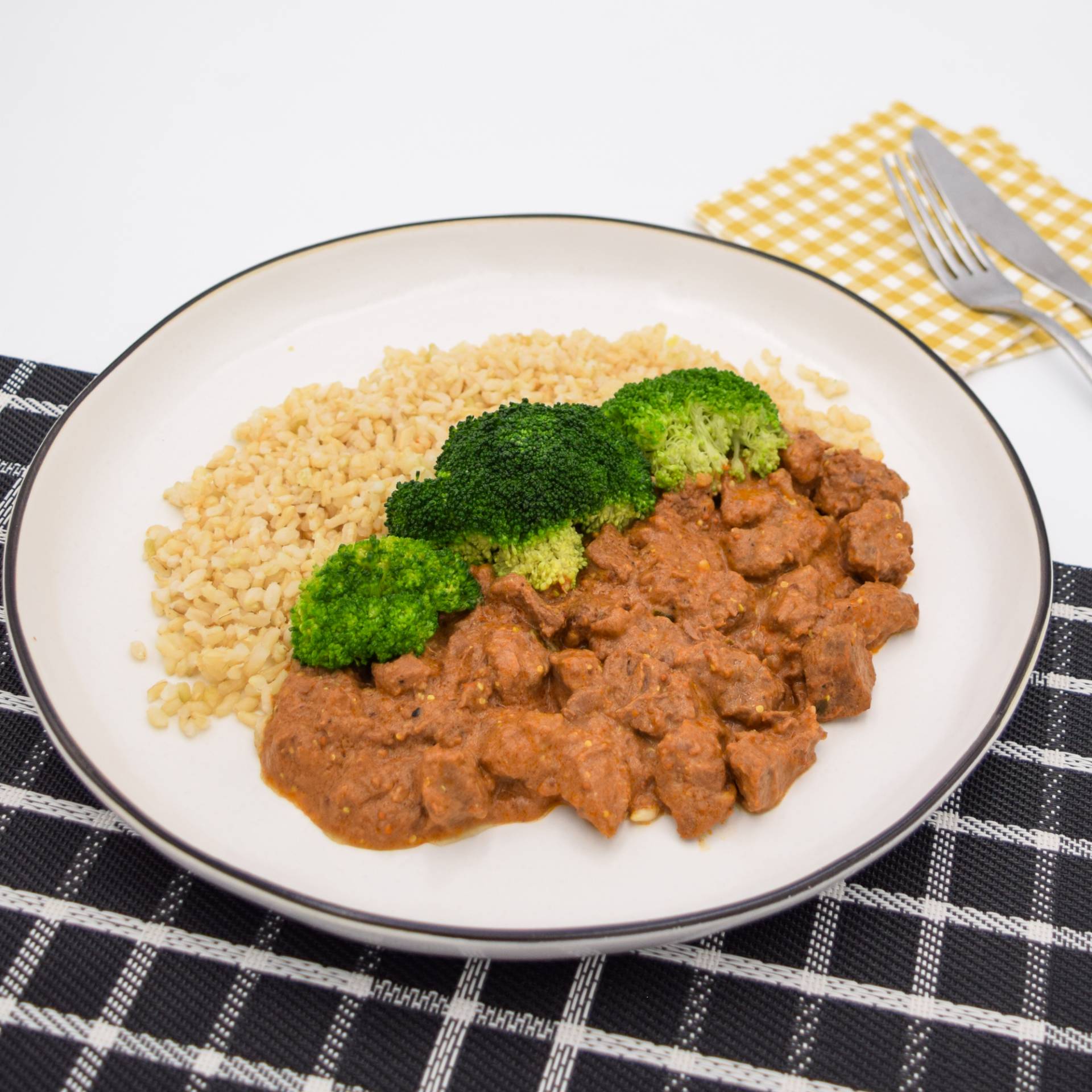Beef stroganoff with brown rice and steamed broccoli